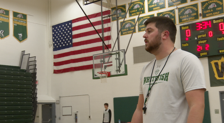 Landon Henderson looks on at basketball practice, Whitefish
