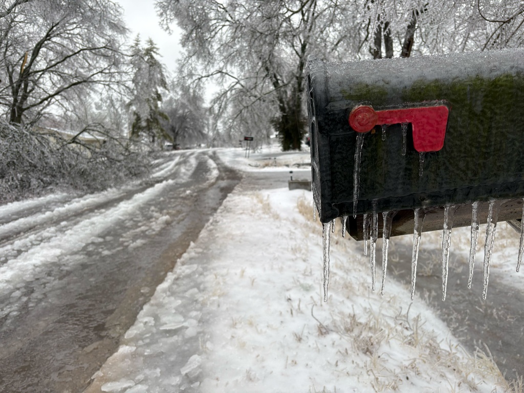 Icicles form on a mailbox on a neighborhood street as a winter storm moves through Nashville, Tenn.