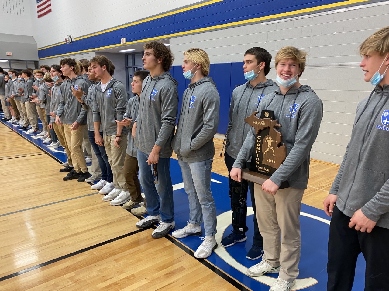 Grand Rapids Catholic Central celebrates their state championship at a school assembly