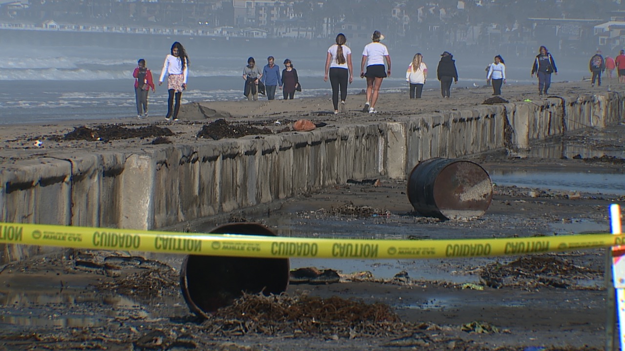 Part of the Mission Beach boardwalk flooded following Thursday's storm.