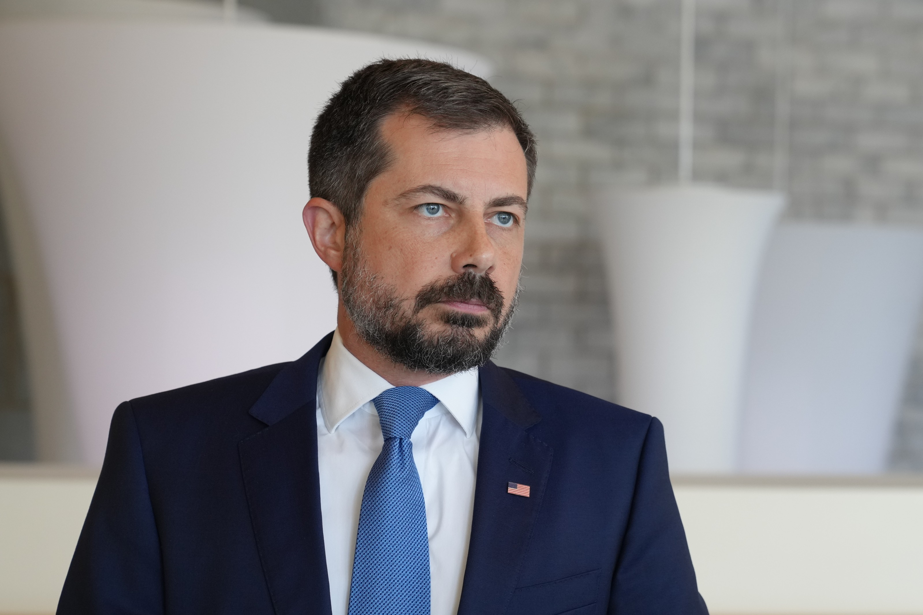 Former Transportation Secretary Pete Buttigieg listens to a reporter's question after speaking at the South Carolina Democratic Party's Spratt Issues Conference, Saturday, Aug. 22, 2026, in Florence, S.C.