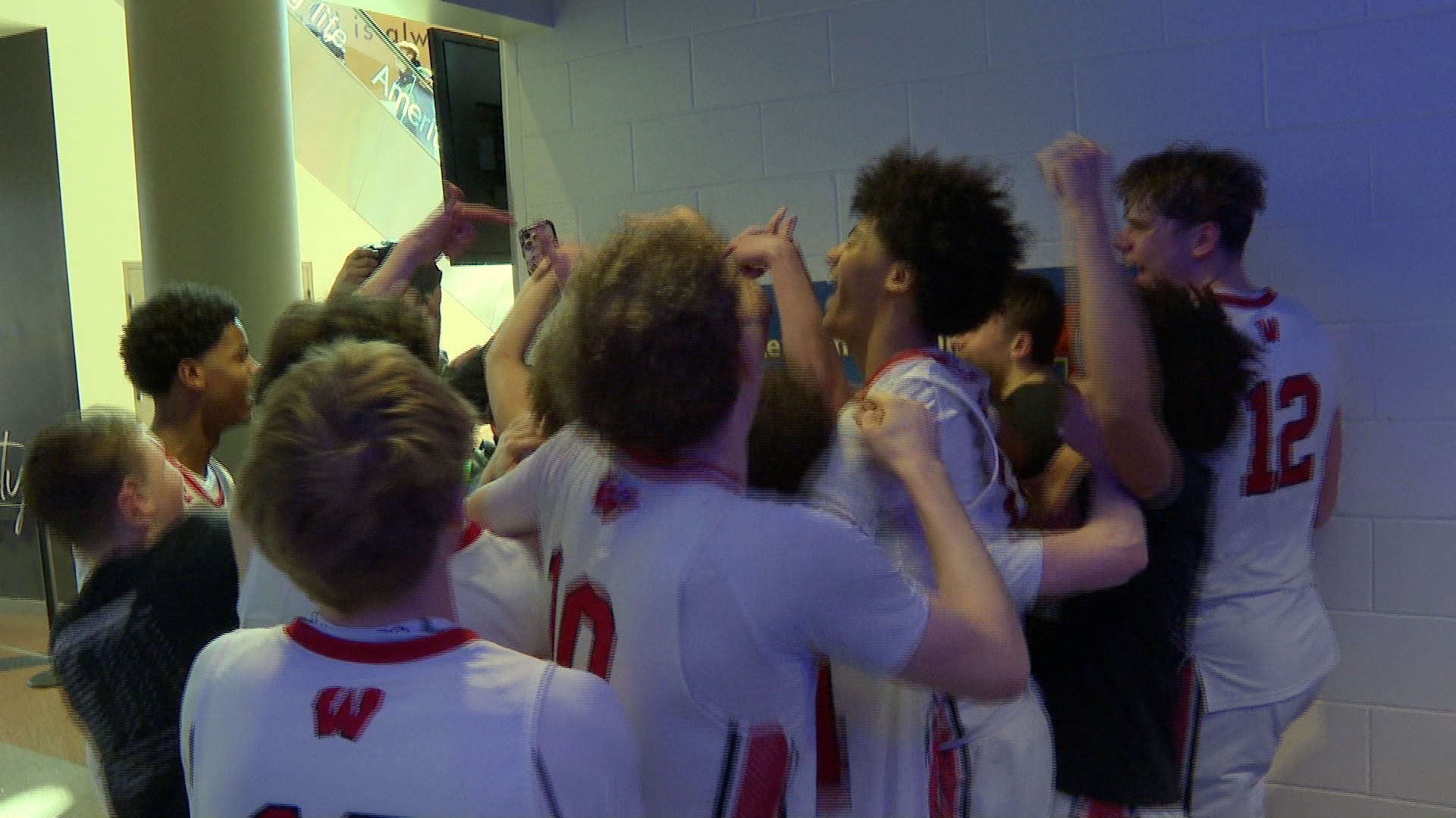 Omaha Westside boys' basketball celebrates a state quarterfinal win