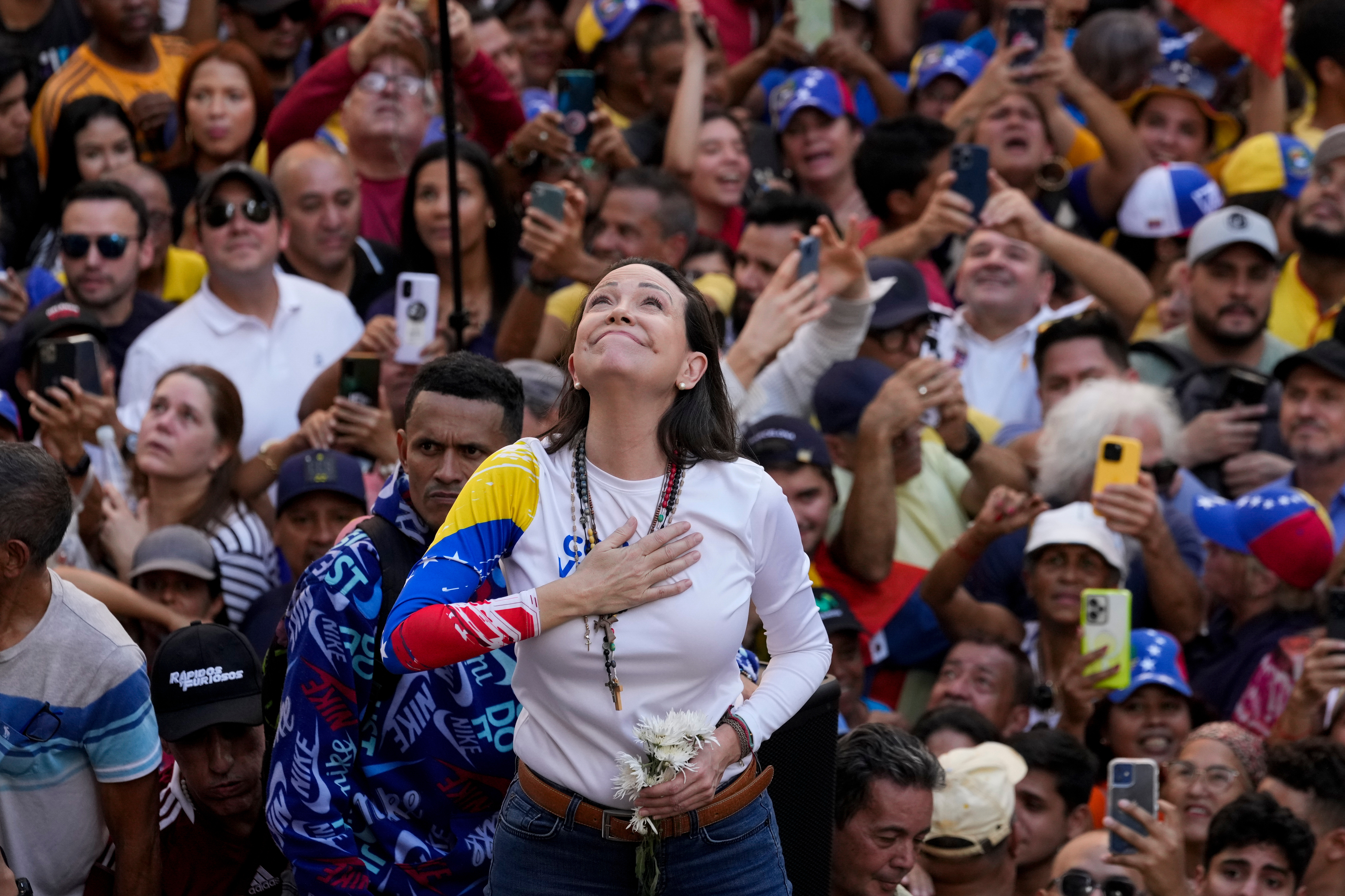 Venezuelan opposition leader Maria Corina Machado addresses supporters at a protest against President Nicolas Maduro in Caracas, Venezuela, Jan. 9, 2025, a day ahead of Maduro's inauguration ceremony where he will be sworn in for a third term. 