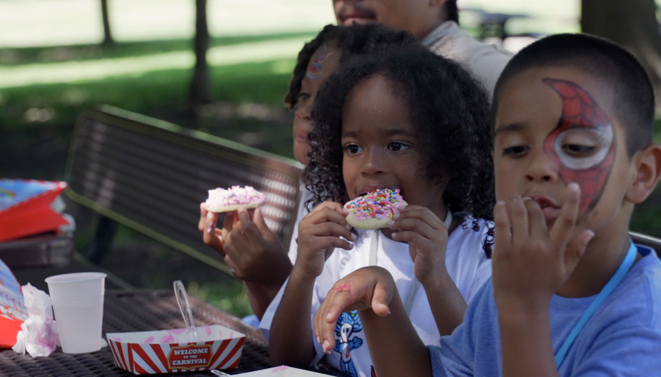 Kids eating cookies