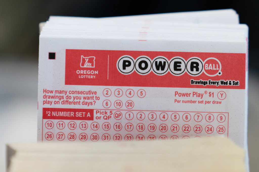 Powerball lottery tickets are sold at a convenience store, Dec. 22, 2025, in Portland, Ore. 