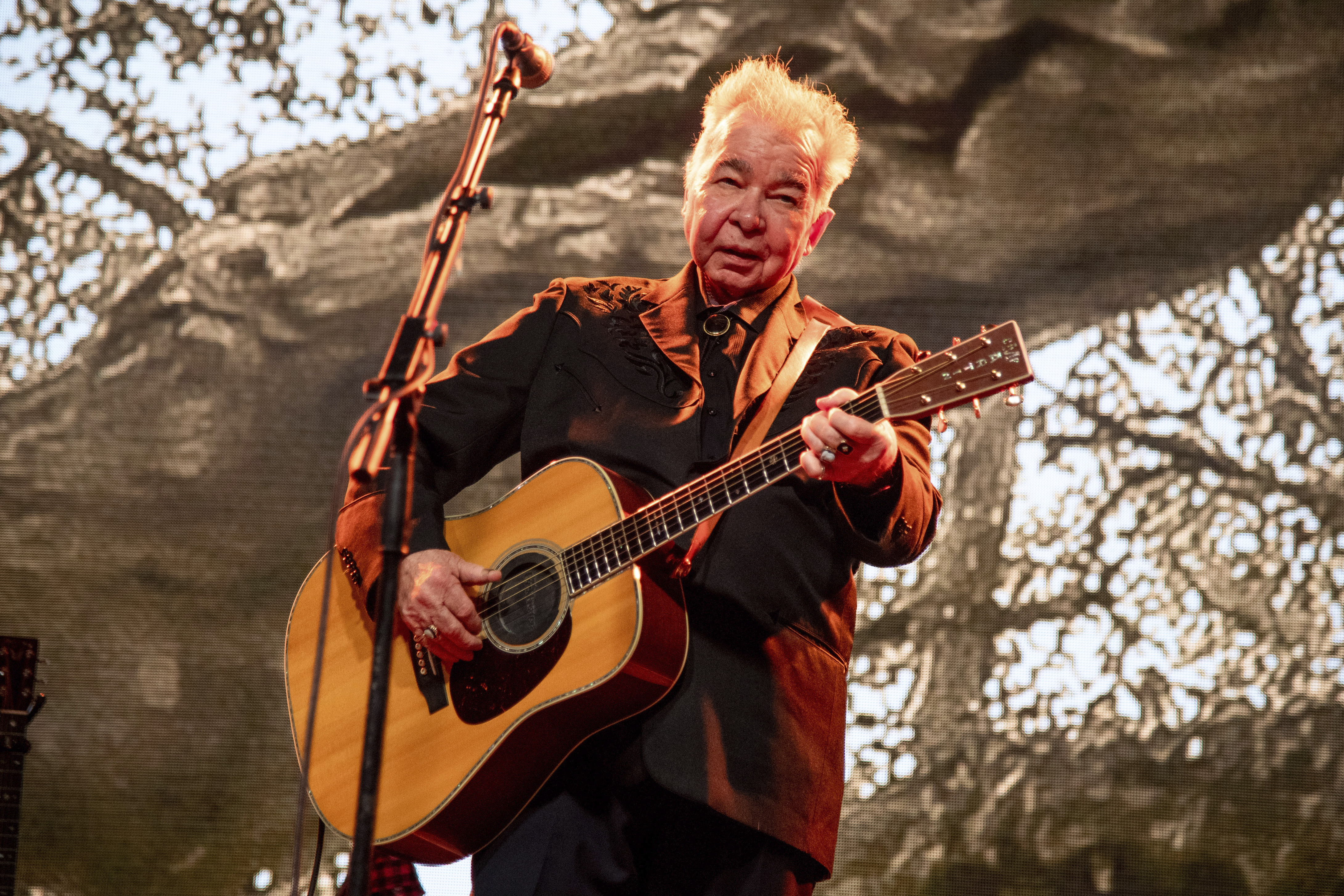 Singer John Prine is in stable condition, his wife says