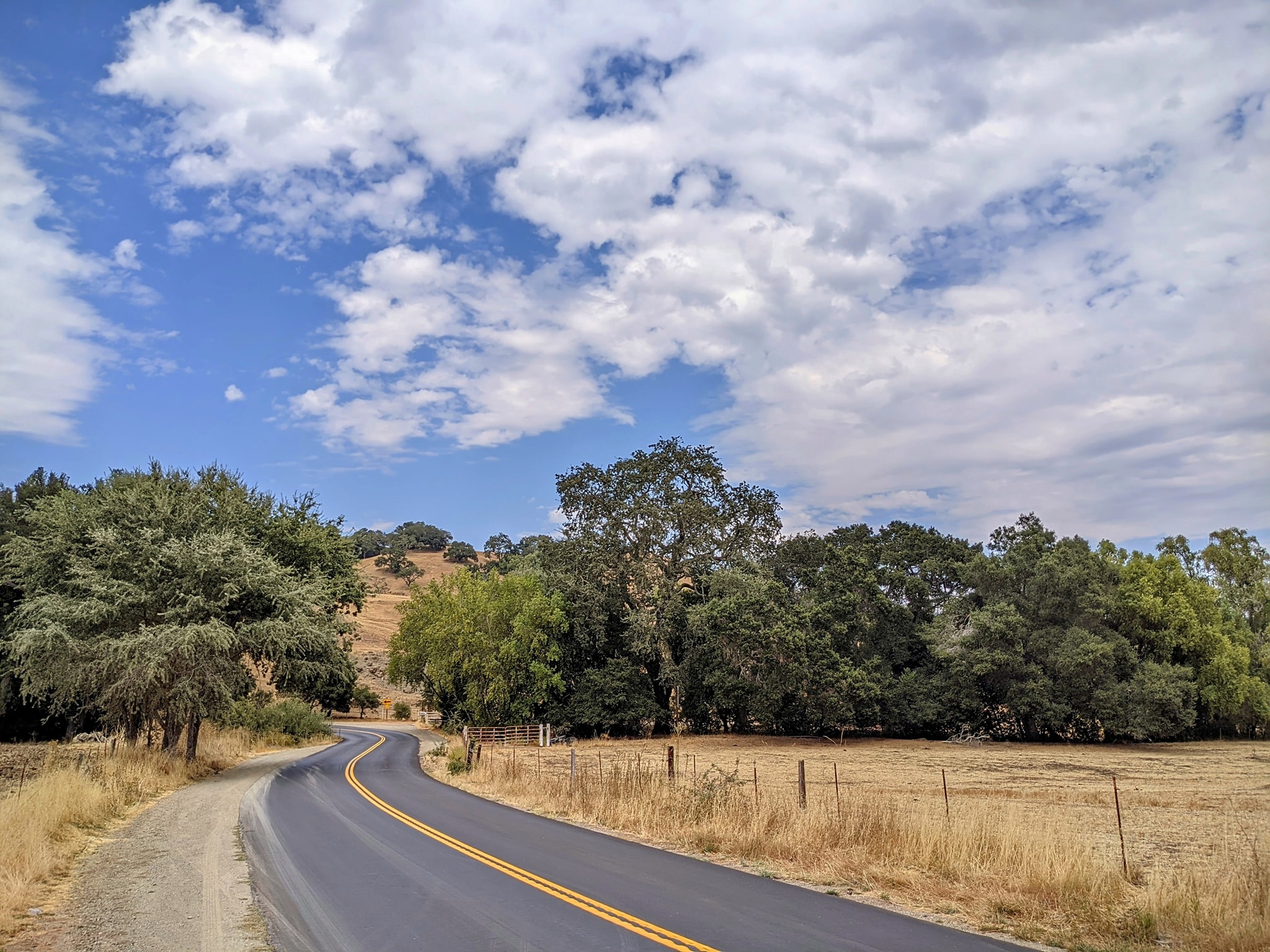 Sun and clouds over Old Creek Road