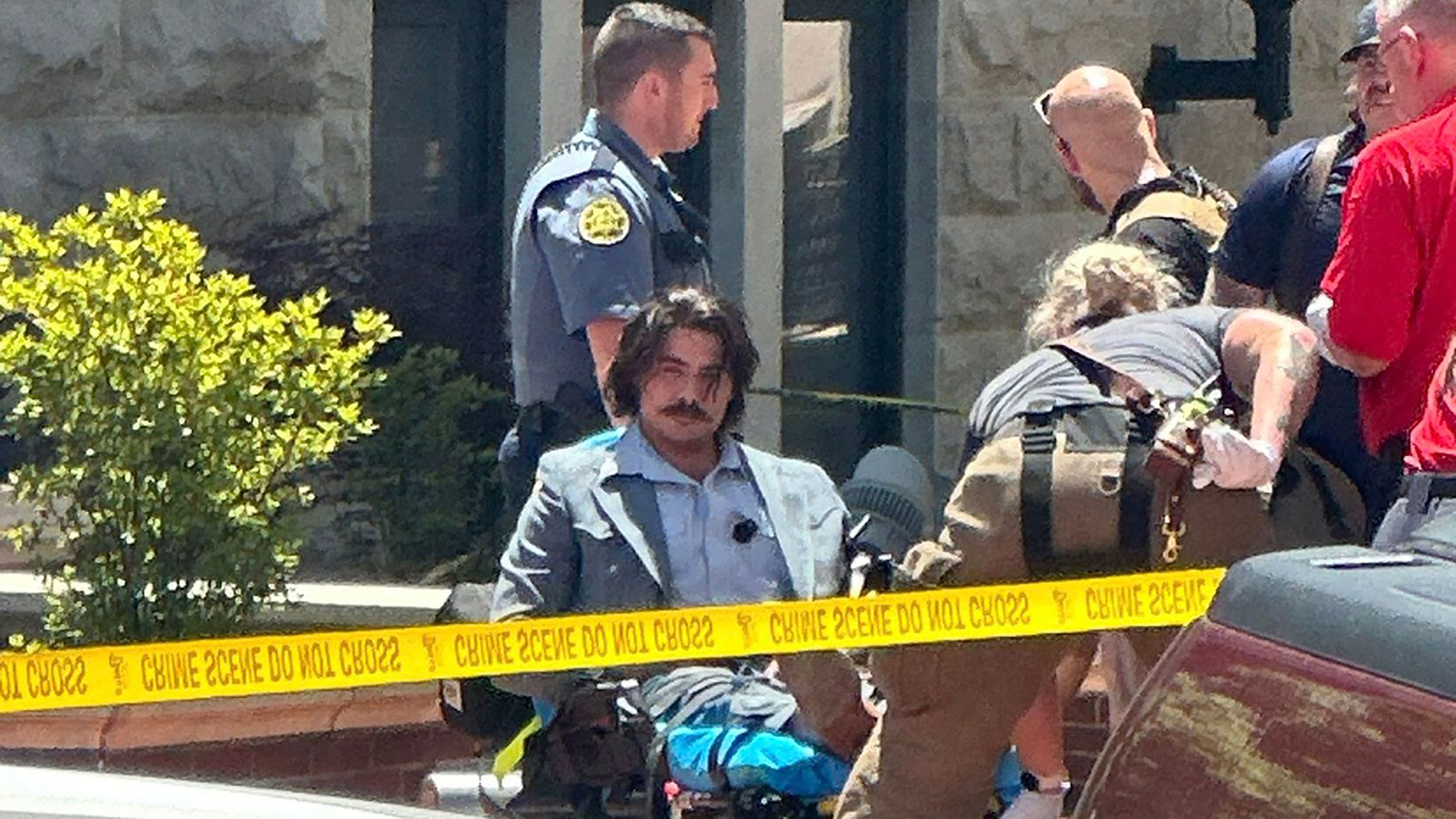 Dalton Eatherly, known as Chud the Builder, is seen on a stretcher after an incident outside a Tennessee courthouse on May 13.