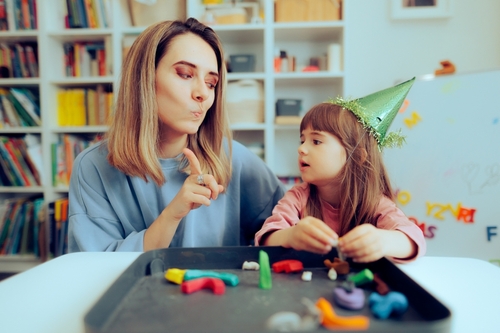 Stock image of a mother waving her finger at her daughter.