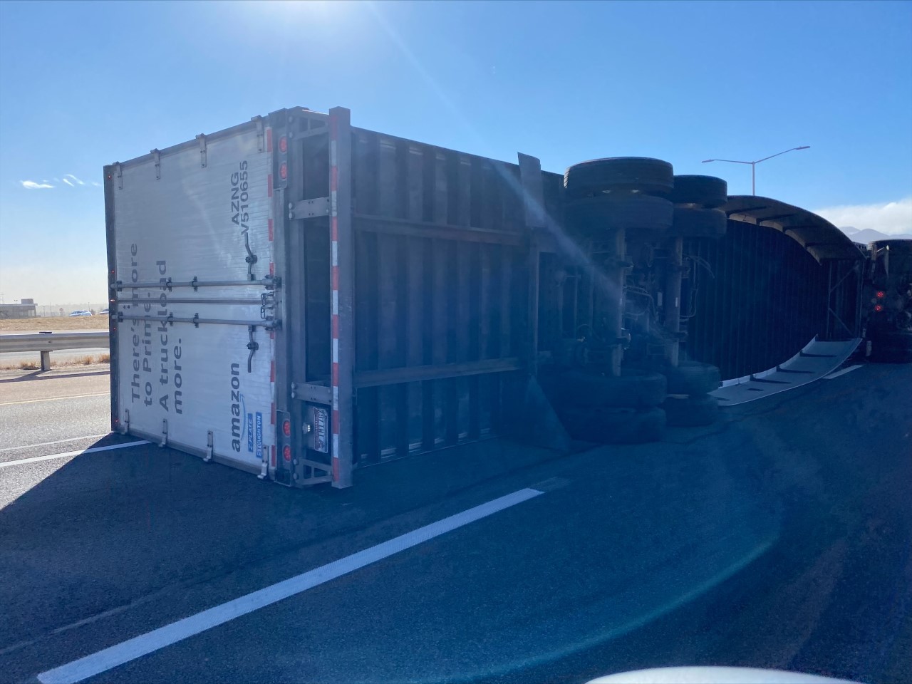 Overturned semi-truck on I-25 South