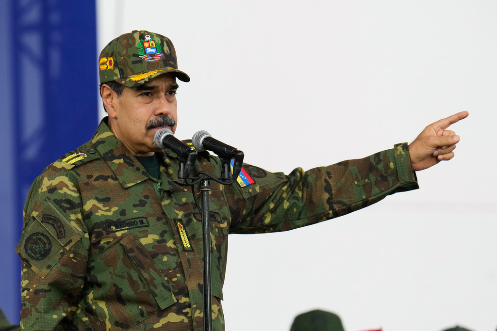 Venezuelan President Nicolas Maduro speaks during a government-organized civic-military rally in Caracas, Venezuela, Tuesday, Nov. 25, 2025. 