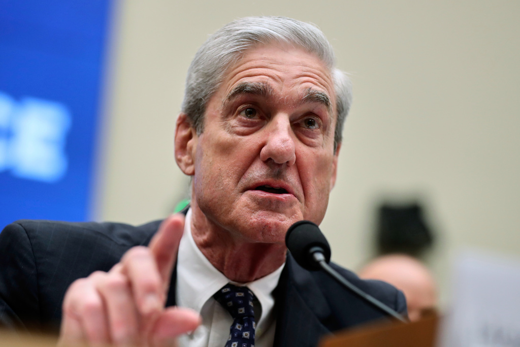 FILE - Former special counsel Robert Mueller testifies before the House Intelligence Committee hearing on his report on Russian election interference, on Capitol Hill, in Washington, July 24, 2019. 