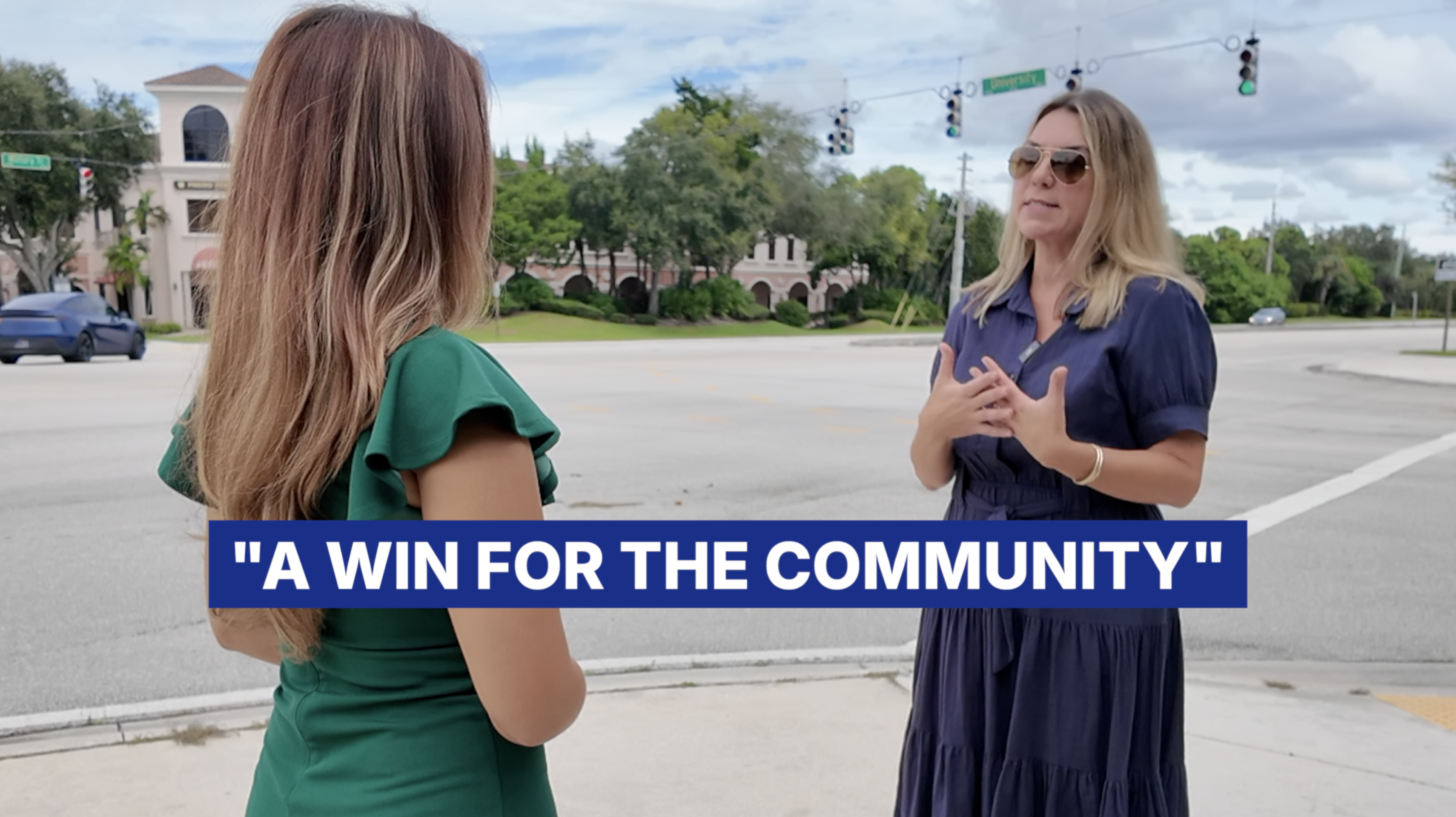 WPTV's Samantha Gutierrez listening to Susan Tinsley at Military Trail and University Boulevard 