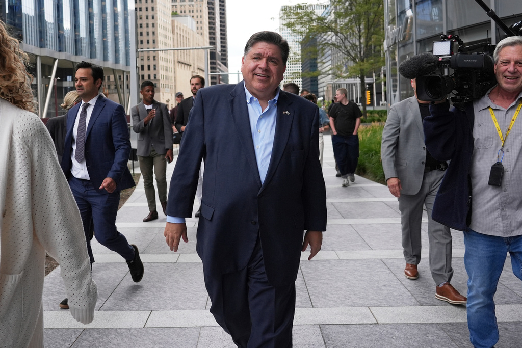 Illinois Governor JB Pritzker walks to River Point Park for a news conference, Aug. 25, 2025, in Chicago. 