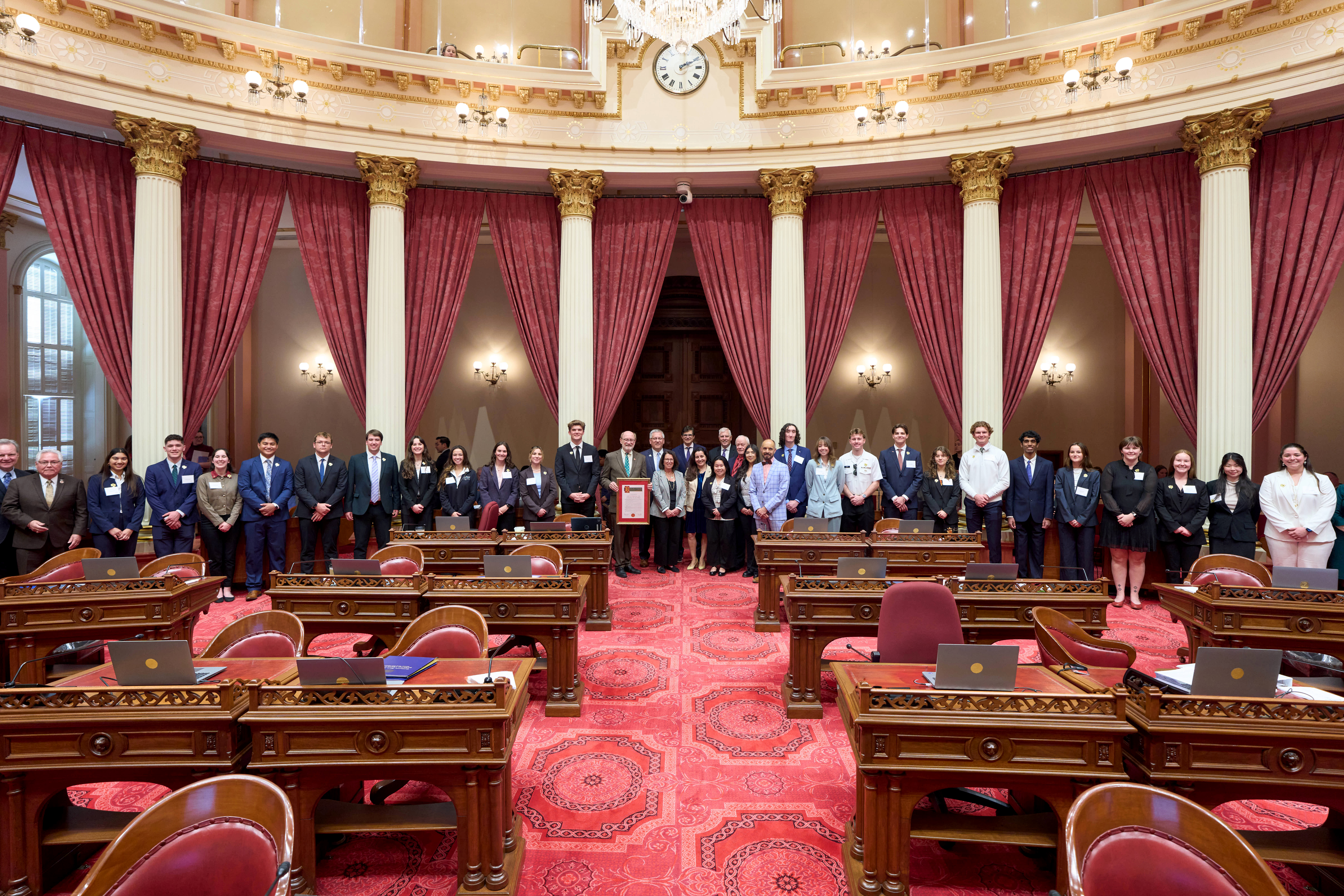 Sen Laird  w joint resolution for c- 125th and students on senate floor_20260202.jpg