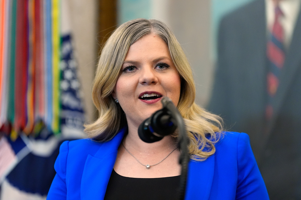 Dr. Heidi Overton, Deputy Director of the White House Domestic Policy Council, speaks about IVF during an event in the Oval Office of the White House with President Donald Trump, Thursday, Oct. 16, 2025, in Washington. 