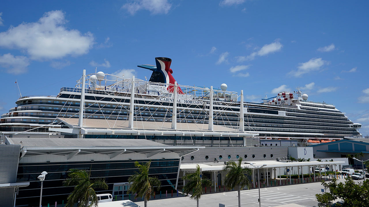 FILE - Carnival Cruise Line's Carnival Horizon cruise ship is shown docked at PortMiami, April 9, 2021, in Miami.
