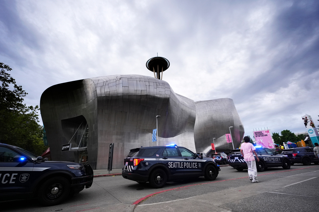 Police respond to a shooting at Seattle Center during the Bite of Seattle food festival Sunday, July 26, 2026, in Seattle, Wash. 