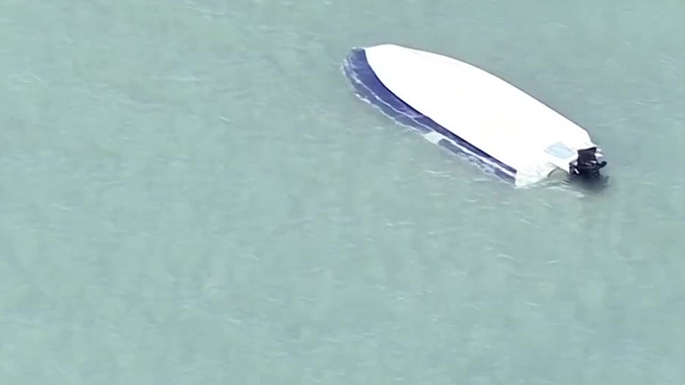 wptv-capsized-boat-haulover-inlet-.jpg