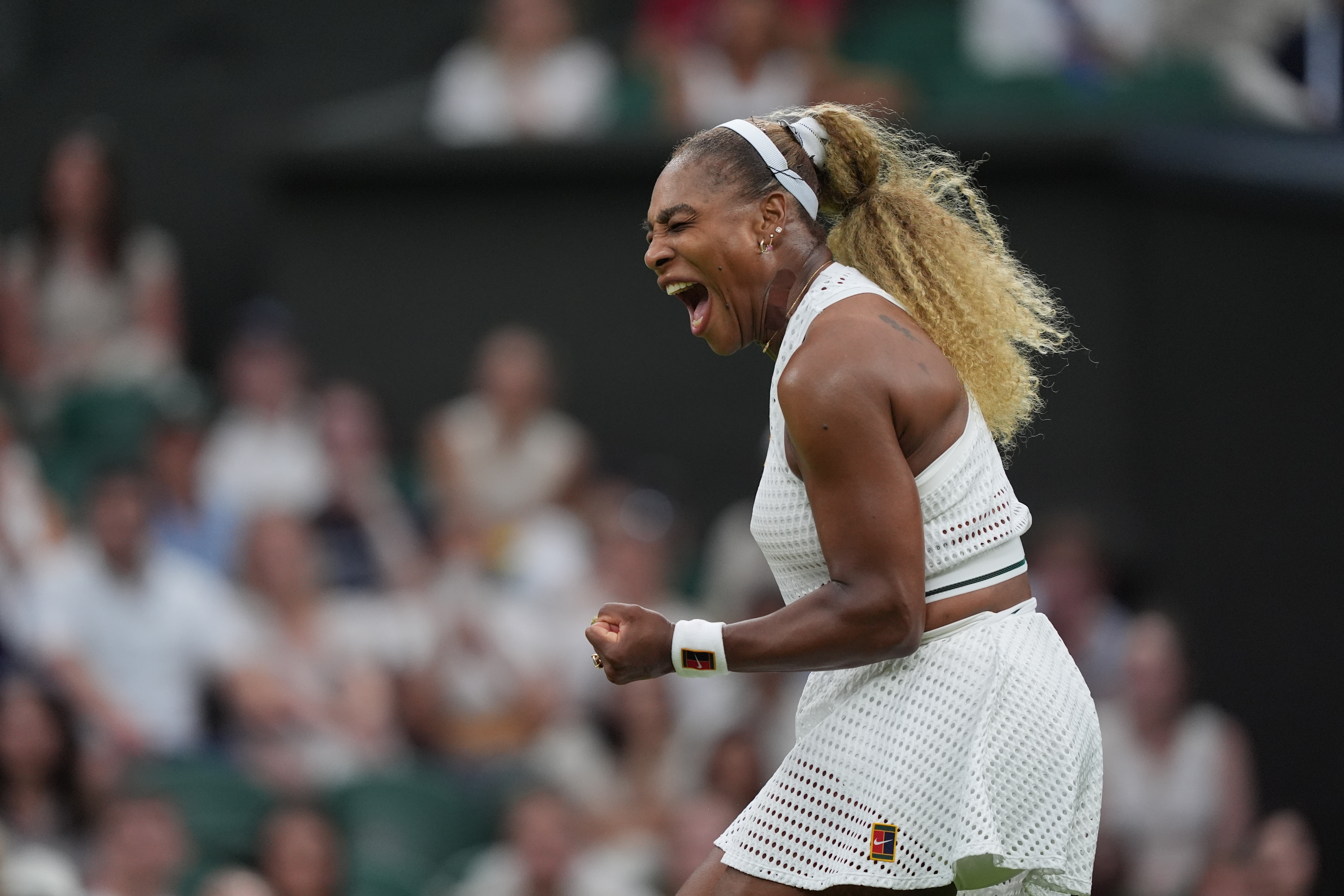 Serena Williams of the United States celebrates winning a point against Maya Joint of Australia in their first round women's singles match at the Wimbledon Tennis Championships in London, Tuesday, June 30, 2026. 