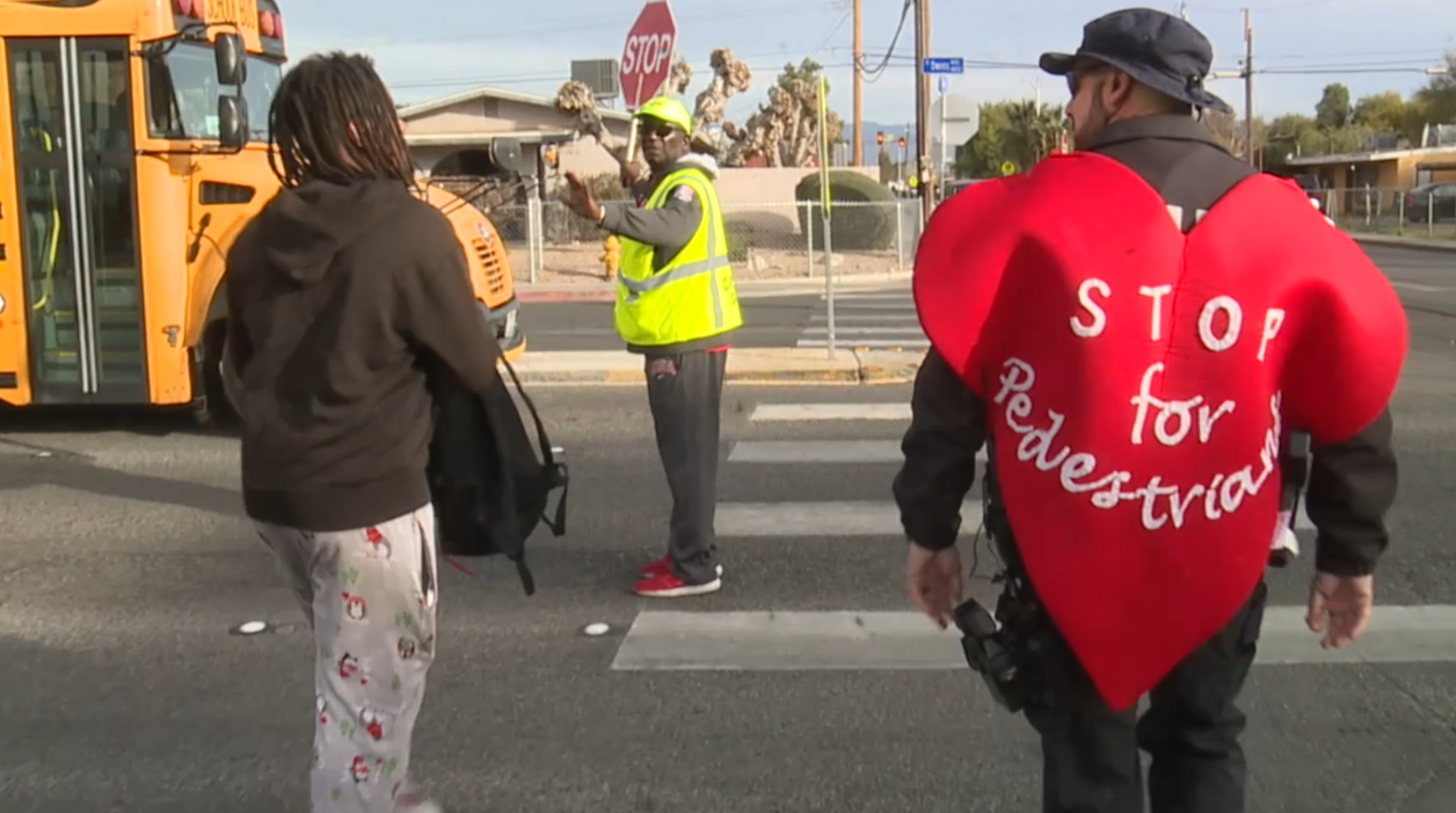  Officers issue Valentine's warnings at crosswalk marked by tragedy