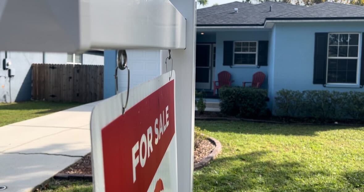 House with for sale sign