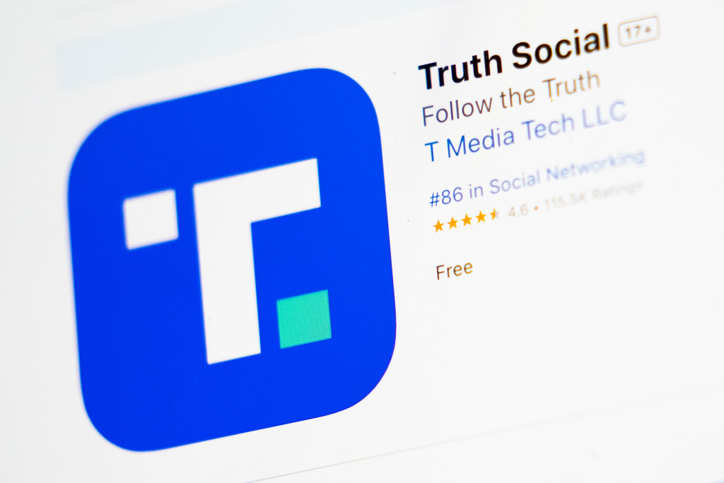 The download screen for Truth Social app is seen on a laptop computer, March 20, 2024, in New York. 