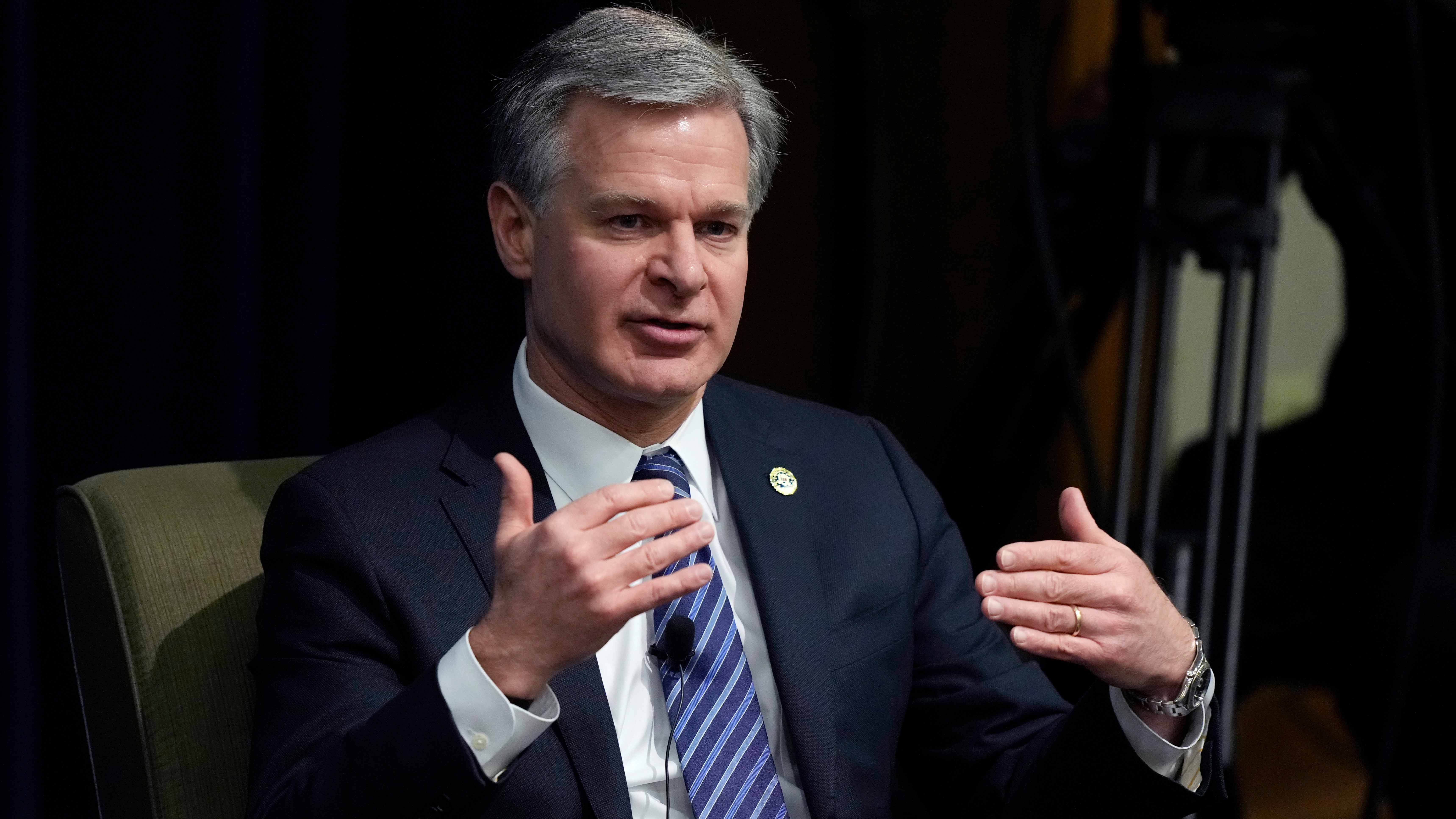 FBI Director Christopher Wray speaks at the Gerald R. Ford School of Public Policy at the University of Michigan, Friday, Dec. 2, 2022, in Ann Arbor, Mich. Wray is raising national security concerns about TikTok, warning Friday that control of the popular video sharing app is in the hands of a Chinese government "that doesn't share our values." 