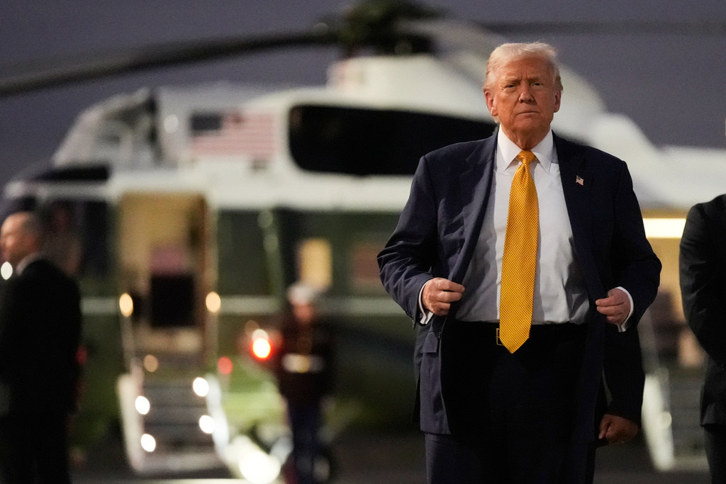 President Donald Trump arrives at Haneda Airport before switching his ride to Marine One in Tokyo, Japan.