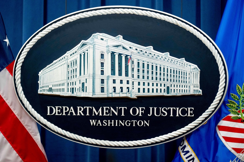 The Justice Department sign is shown in Washington.