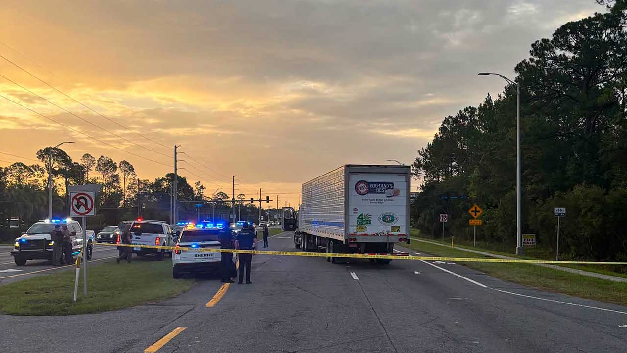 In this photo provided by the St. Johns County Sheriff's Office, the eastbound lanes of SR 16 between Outlet Mall Boulevard and Inman Road in St. Augustine, Fla., were shut down after a fatal collision. 