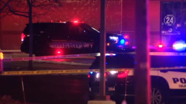 Investigators work the scene of an overnight officer involved shooting 