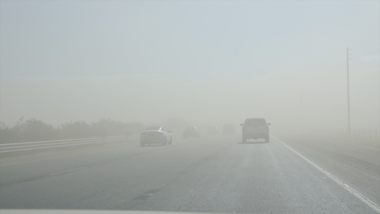 Drivers Navigate Dangerous Dust Clouds and High Winds on Highway 99