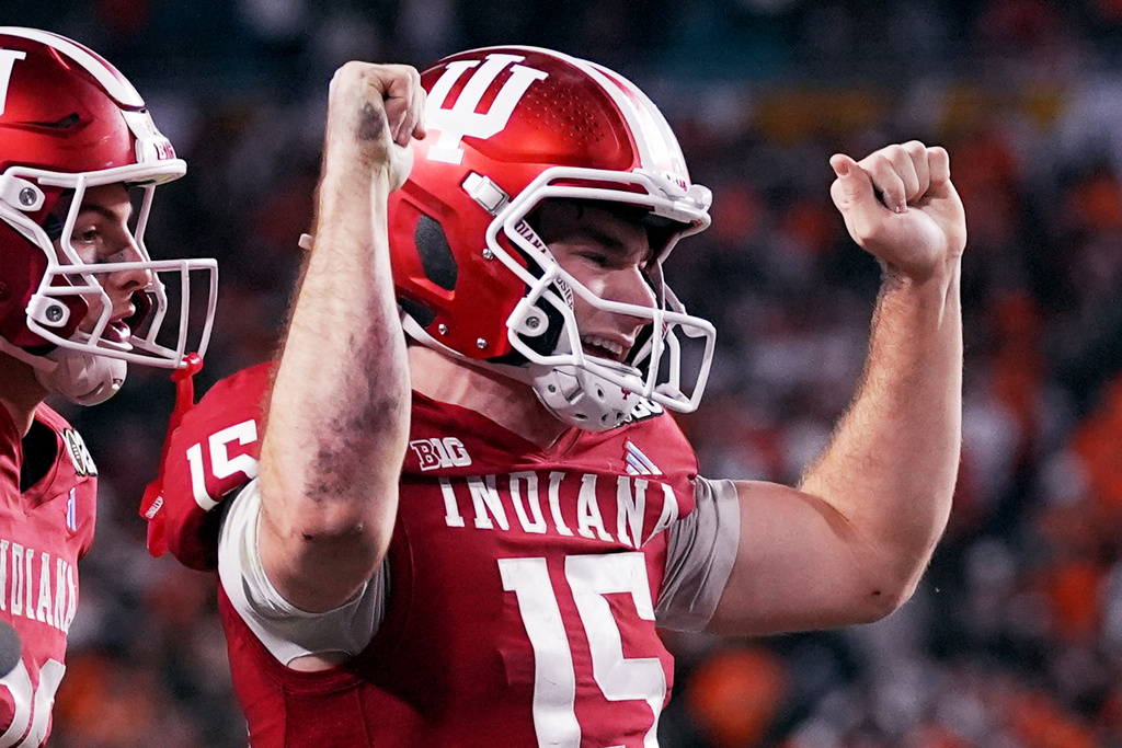 Indiana quarterback Fernando Mendoza celebrates after scoring against Miami during the second half of the College Football Playoff national championship game, Monday, Jan. 19, 2026, in Miami Gardens, Fla. 