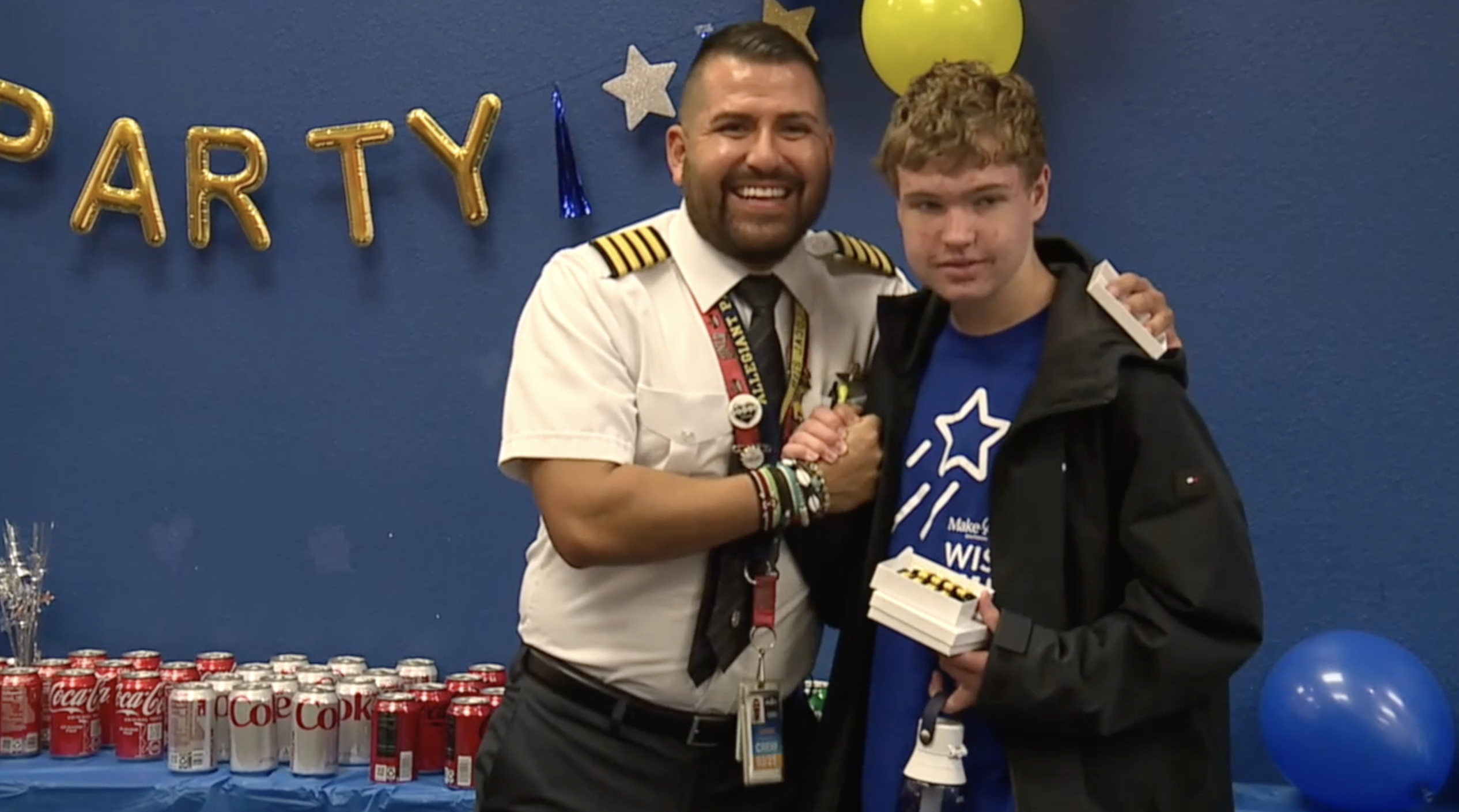 Ben Hartigan (right) receives Make-A-Wish to become pilot for a day with Allegiant's help. 
