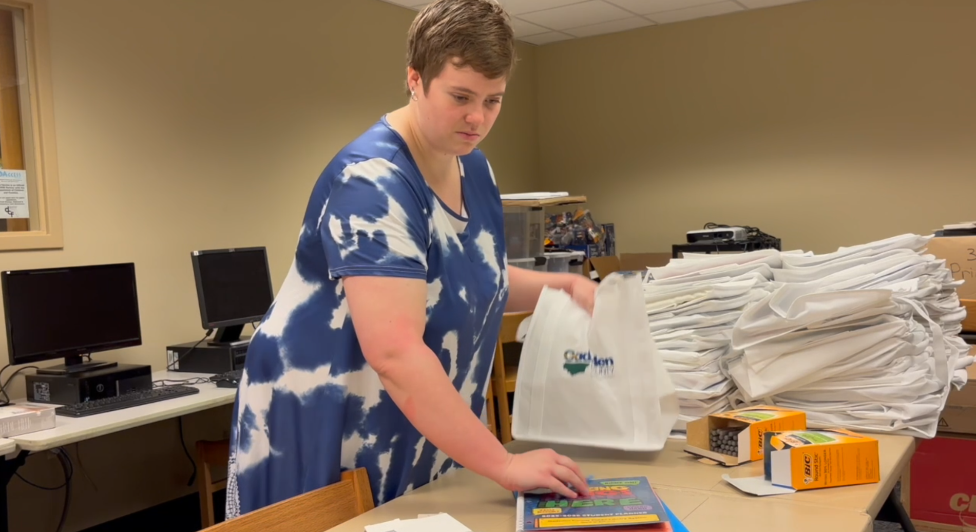 Gadsden librarian assembles bags for students