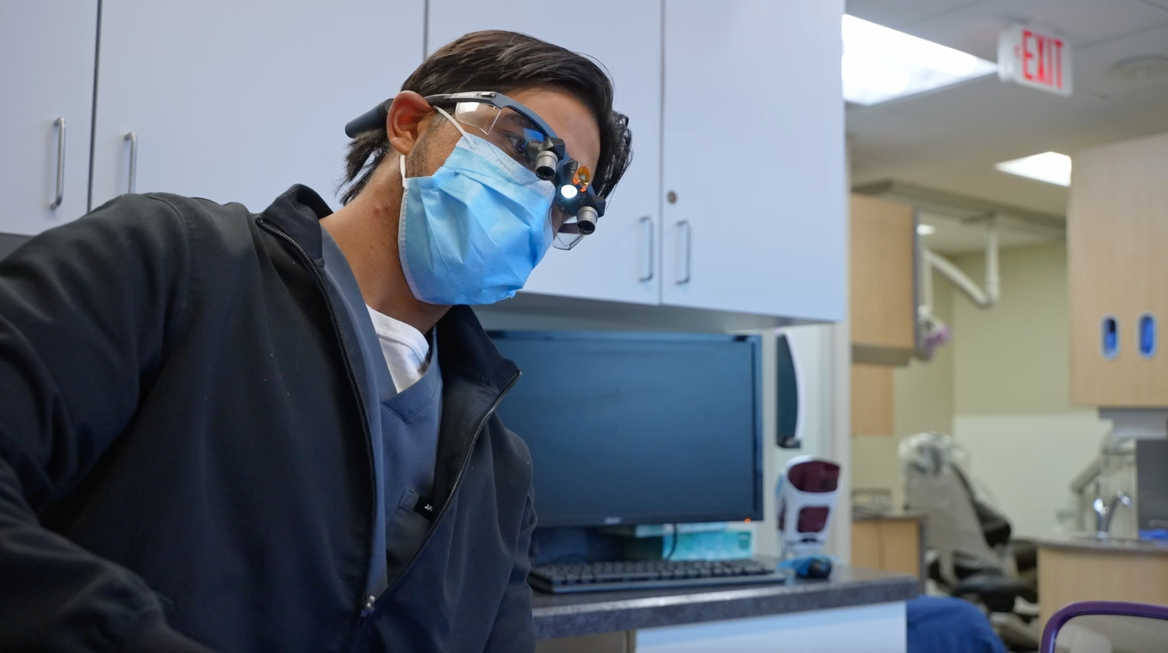 Dr. Eduardo Simo-Miranda doing dental work  