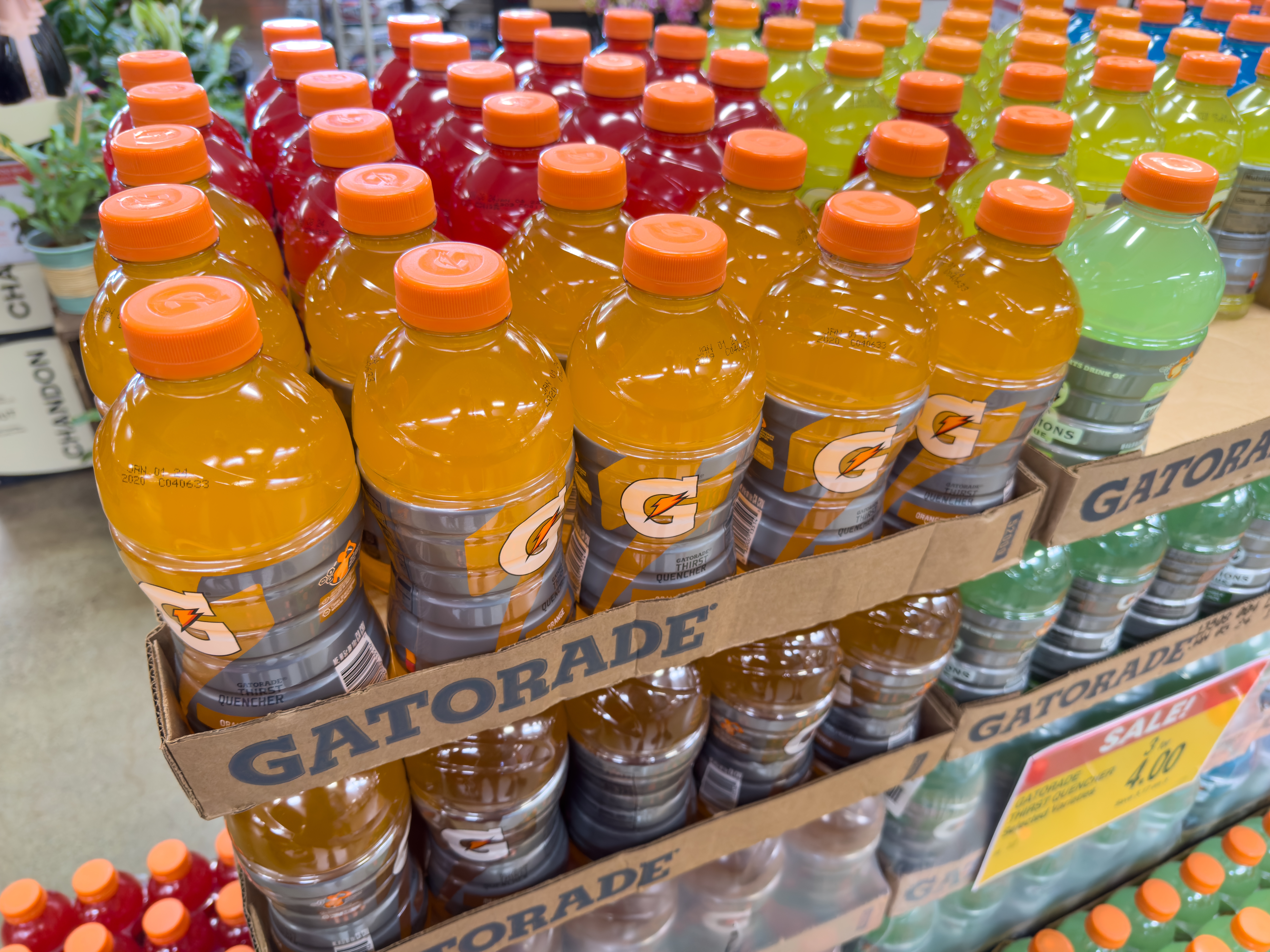 Lots of Gatorade sports drink bottles on sale inside local supermarket.