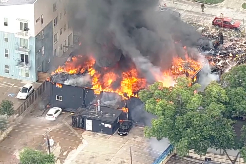 This image made from video provided by KDFW FOX 4 shows a large fire at an apartment complex in Dallas, Thursday, May 28, 2026. 