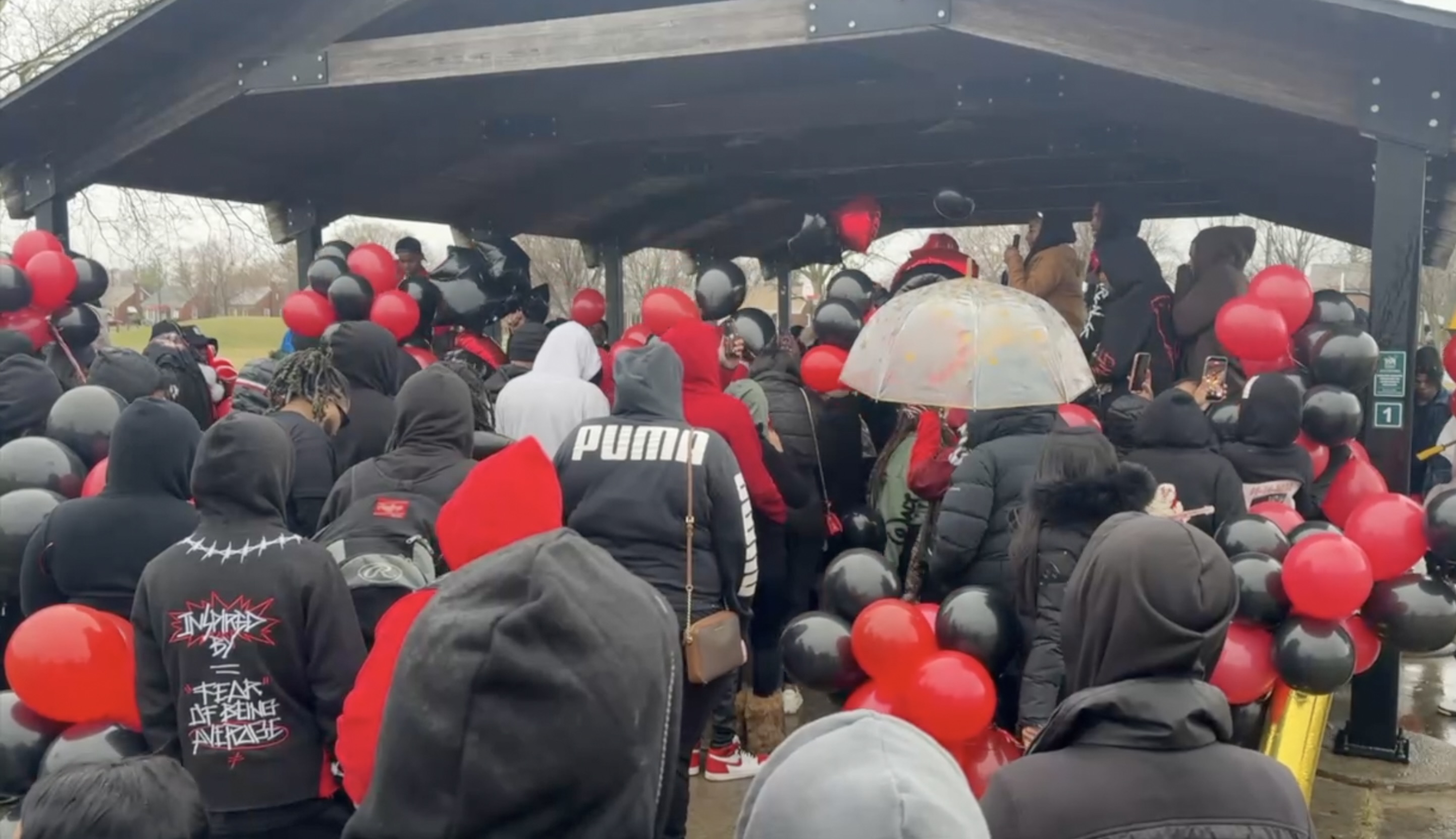 Family and friends hold vigil for 23-year-old rapper killed in Clinton Township police chase