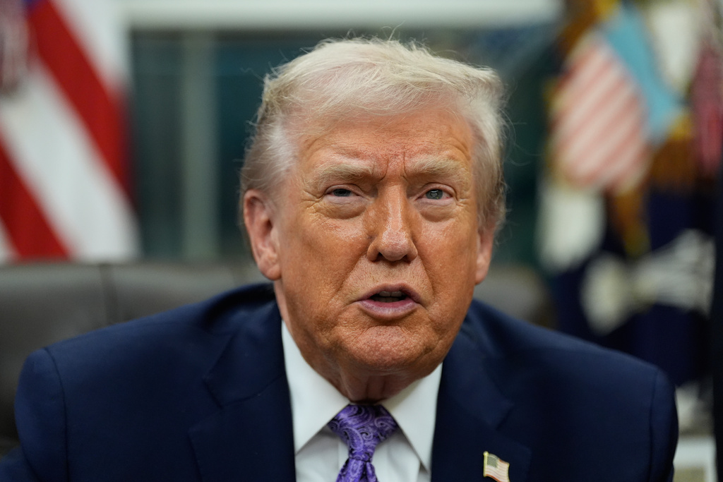 President Donald Trump speaks during a signing ceremony in the Oval Office of the White House, Dec. 11, 2025, in Washington. 