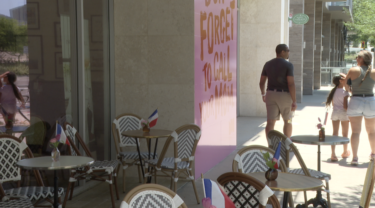 People are enjoying local businesses even in the heat. 
