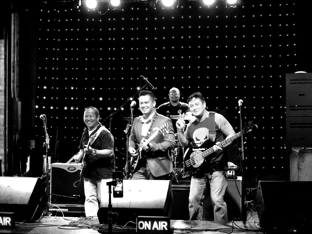 Ace-Marasigan-center-in-band-on-stage.jpg