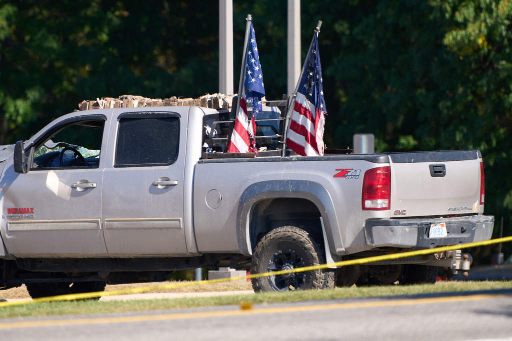 Debris is seen on the vehicle used by the man who allegedly rammed his vehicle into The Church of Jesus Christ of Latter-day Saints in Grand Blanc Township, Mich. on Sunday Morning, before opening fire and setting the building ablaze, Tuesday, Sept. 30, 2025. 