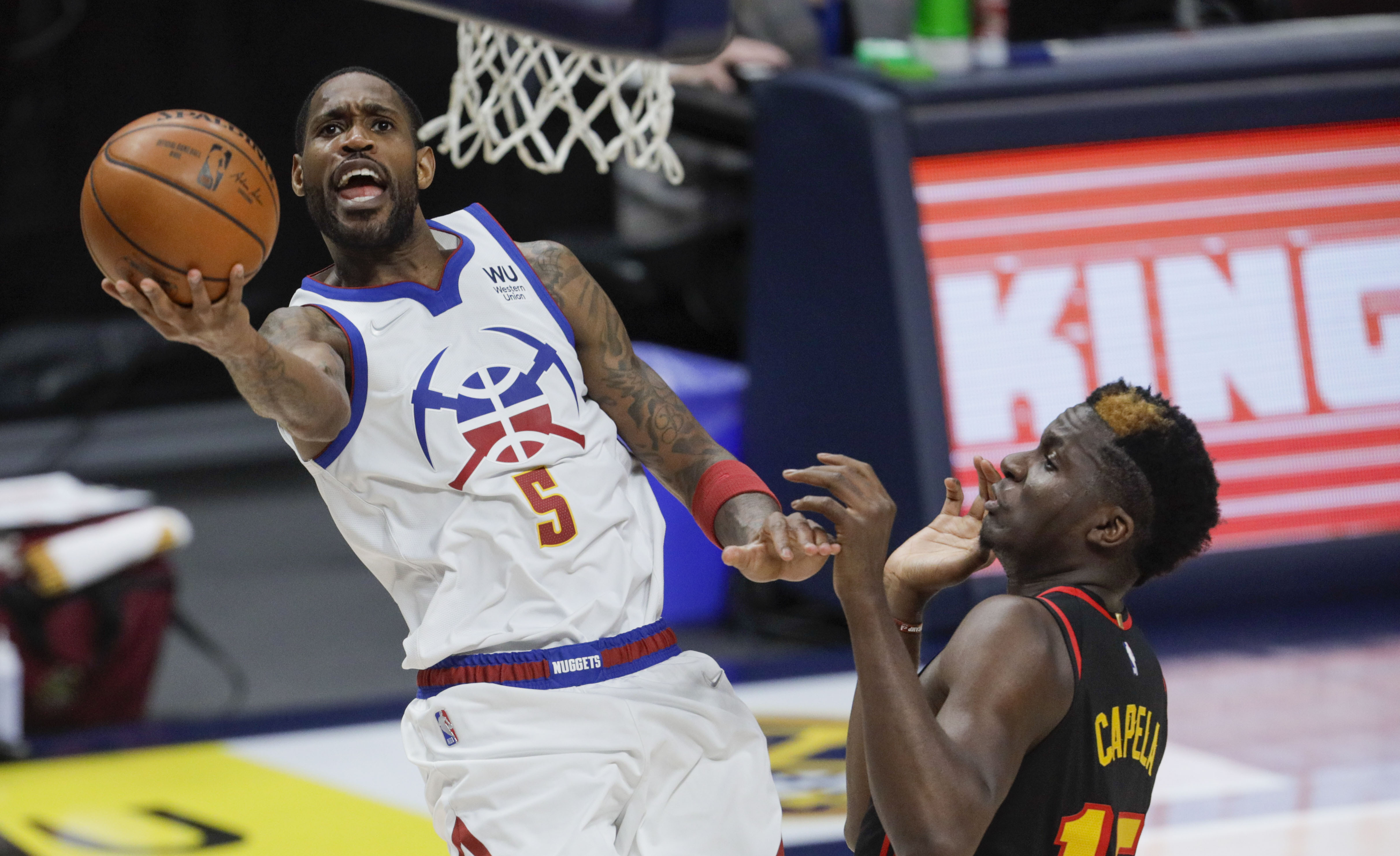 Gordon scores 13 in Denver debut, a 126-102 win over Hawks