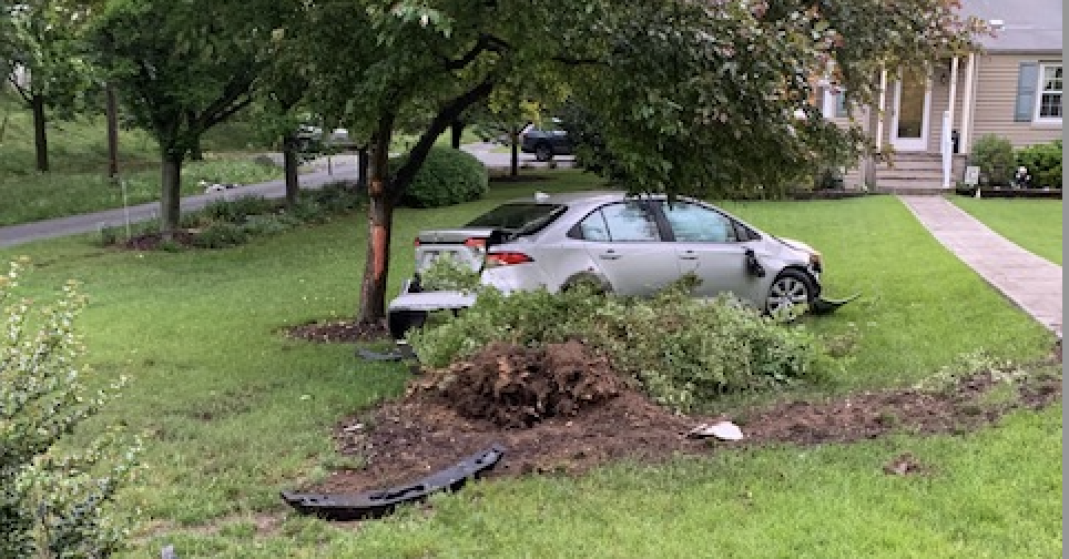 car in yard.png
