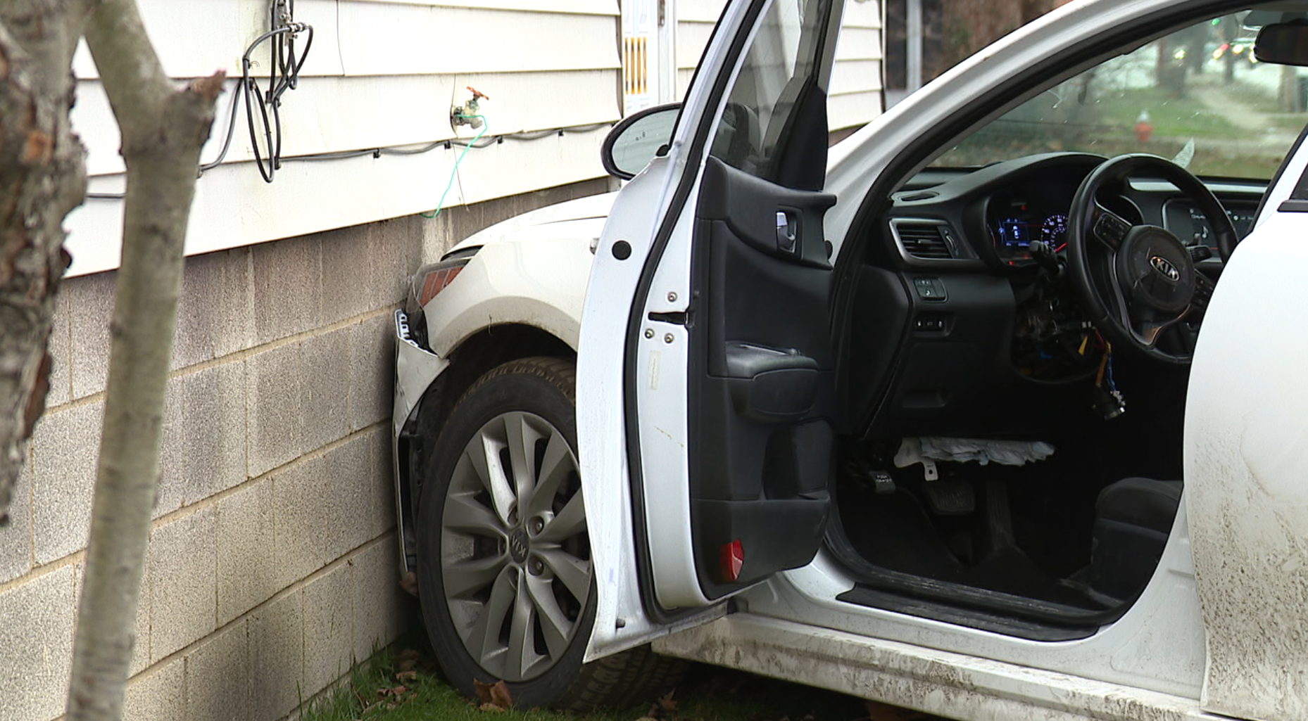 Crashed stolen car on Denison Avenue