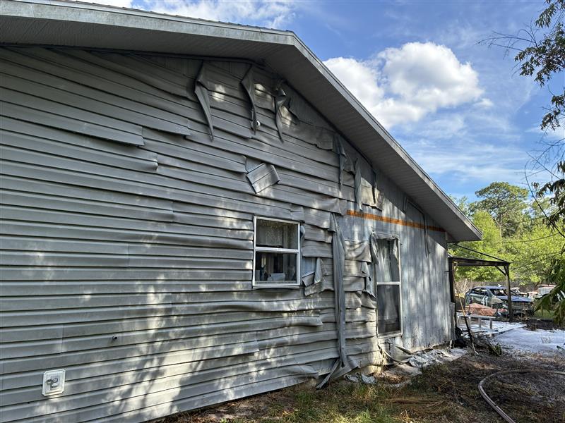 W Tennesse Ln Structure Heat Damage.jpeg