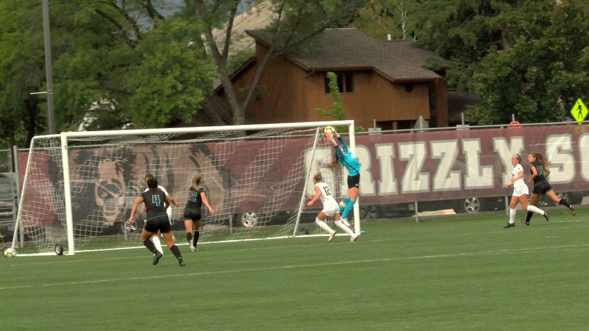 Claire Howard leaping save.jpg