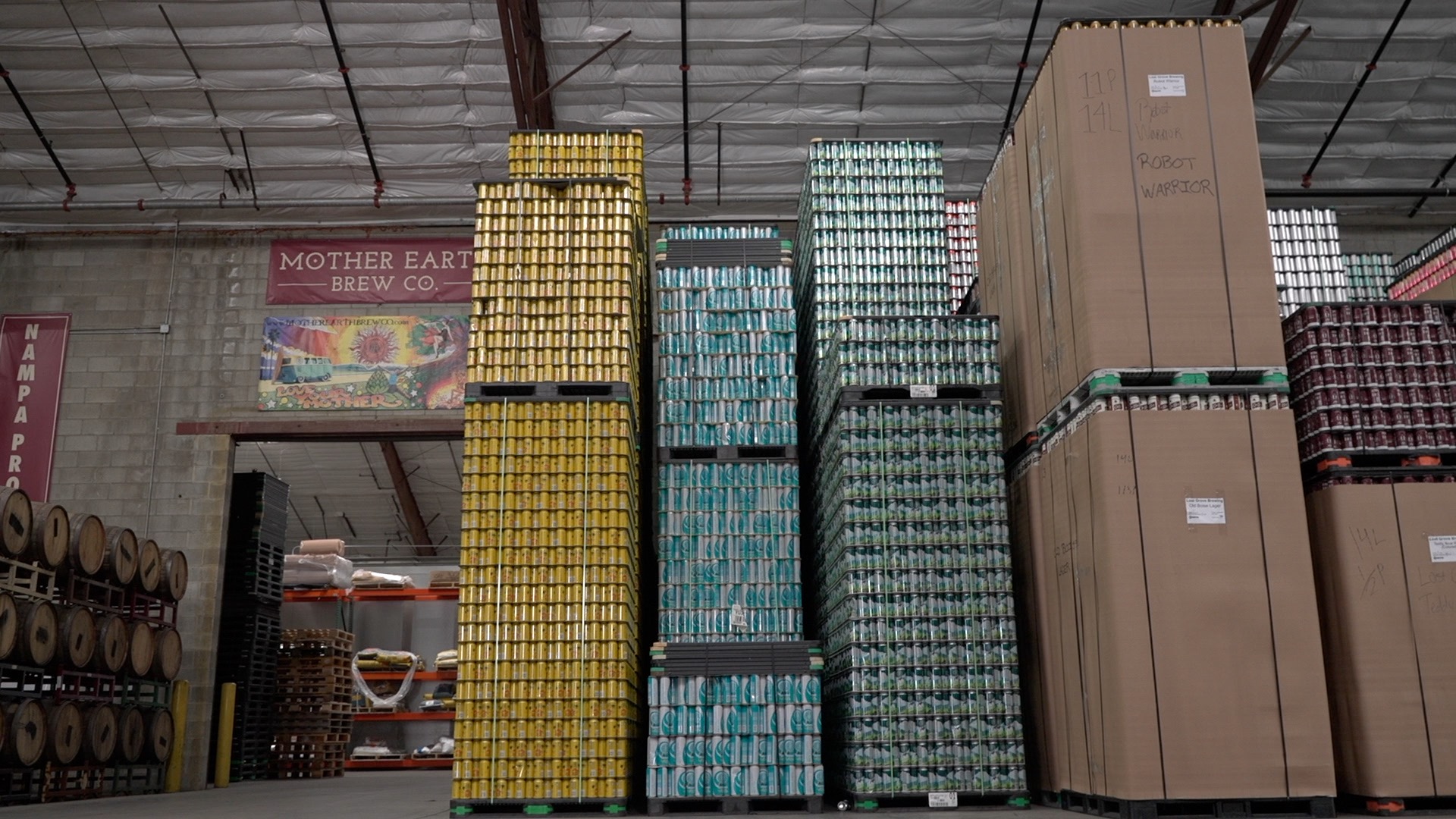 Pallets of cans waiting for beer at Mother Earth Brewing